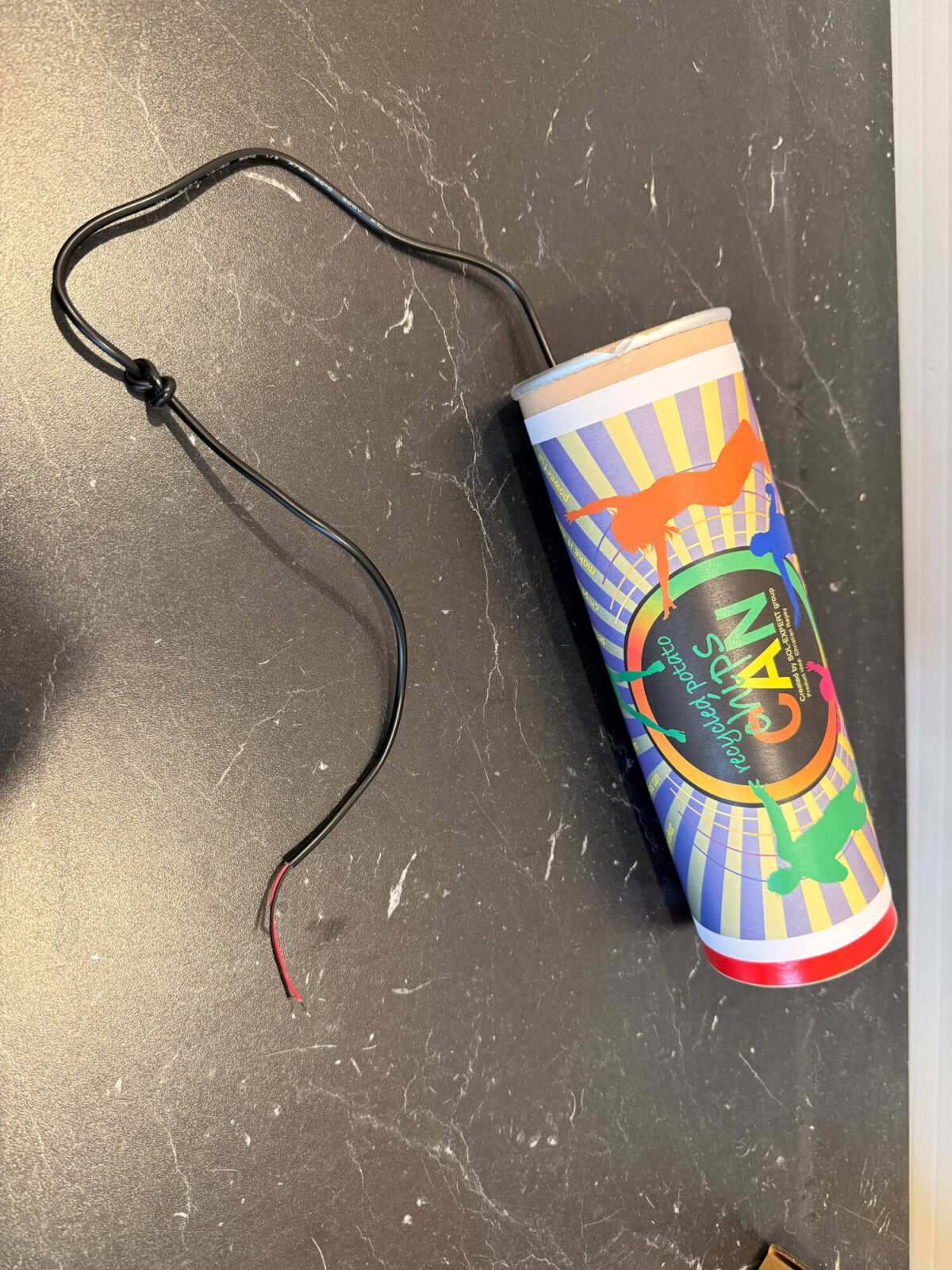 Bild 7: ... und ca. 20cm vor dem offenen Ende ein Knoten setzen.