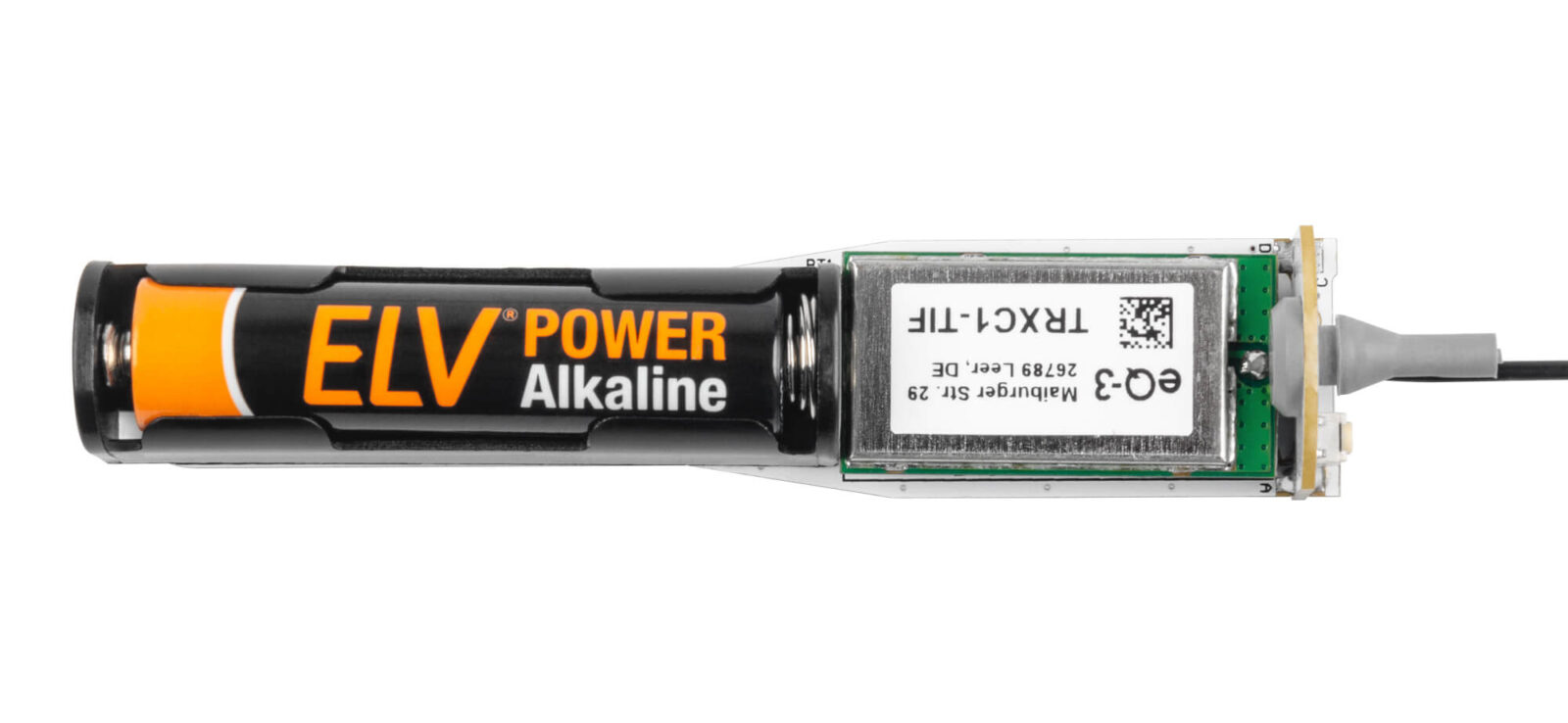 Schritt 6: Die Batterie wird gemäß den Polaritätsmarkierungen im Fach platziert.